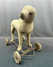 Load image into Gallery viewer, Well Loved Toy Dog On Wheels
