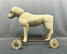 Load image into Gallery viewer, Well Loved Toy Dog On Wheels
