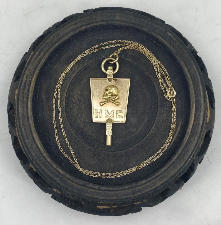 Gold Watch Key with Skull